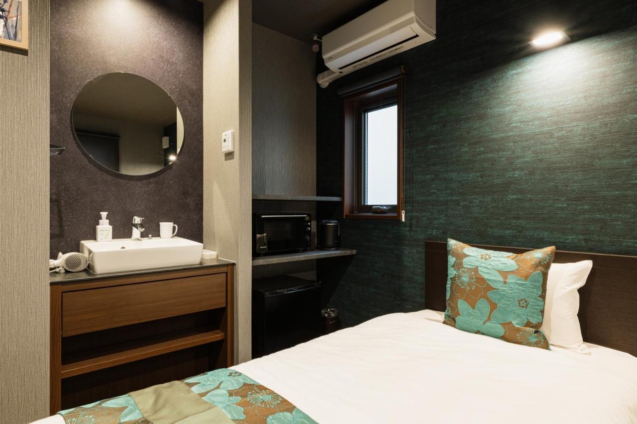 Aparthotel Grand Base Haruyoshi à Fukuoka  Extérieur photo